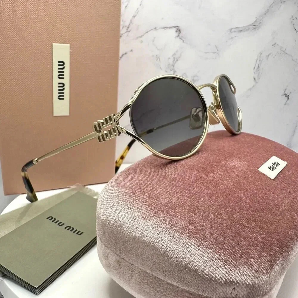 Miu Miu Gold Frame Sunglasses with Black Lenses